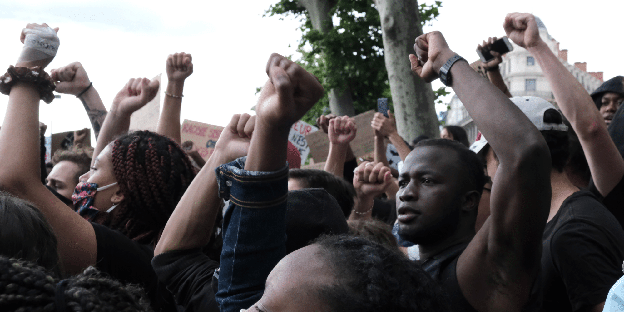 Group raising fist in protest