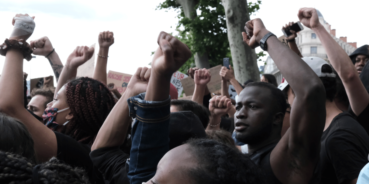 Group raising fist in protest