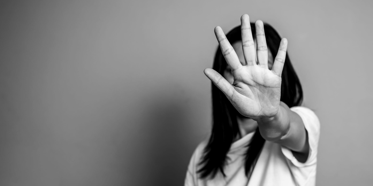 woman raised her hand outstretched