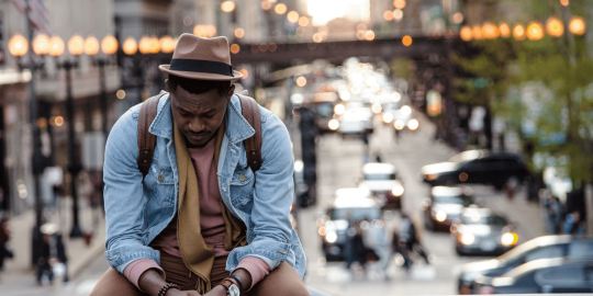 Man sitting down outside(1)